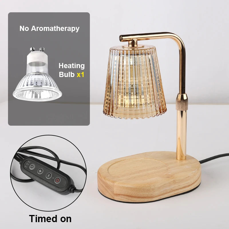 Candle warmer lamp with gold arm, ribbed amber glass shade, and wooden base; inset graphics show the included heating bulb and the wired timer and dimmer control labeled 'Timed on'